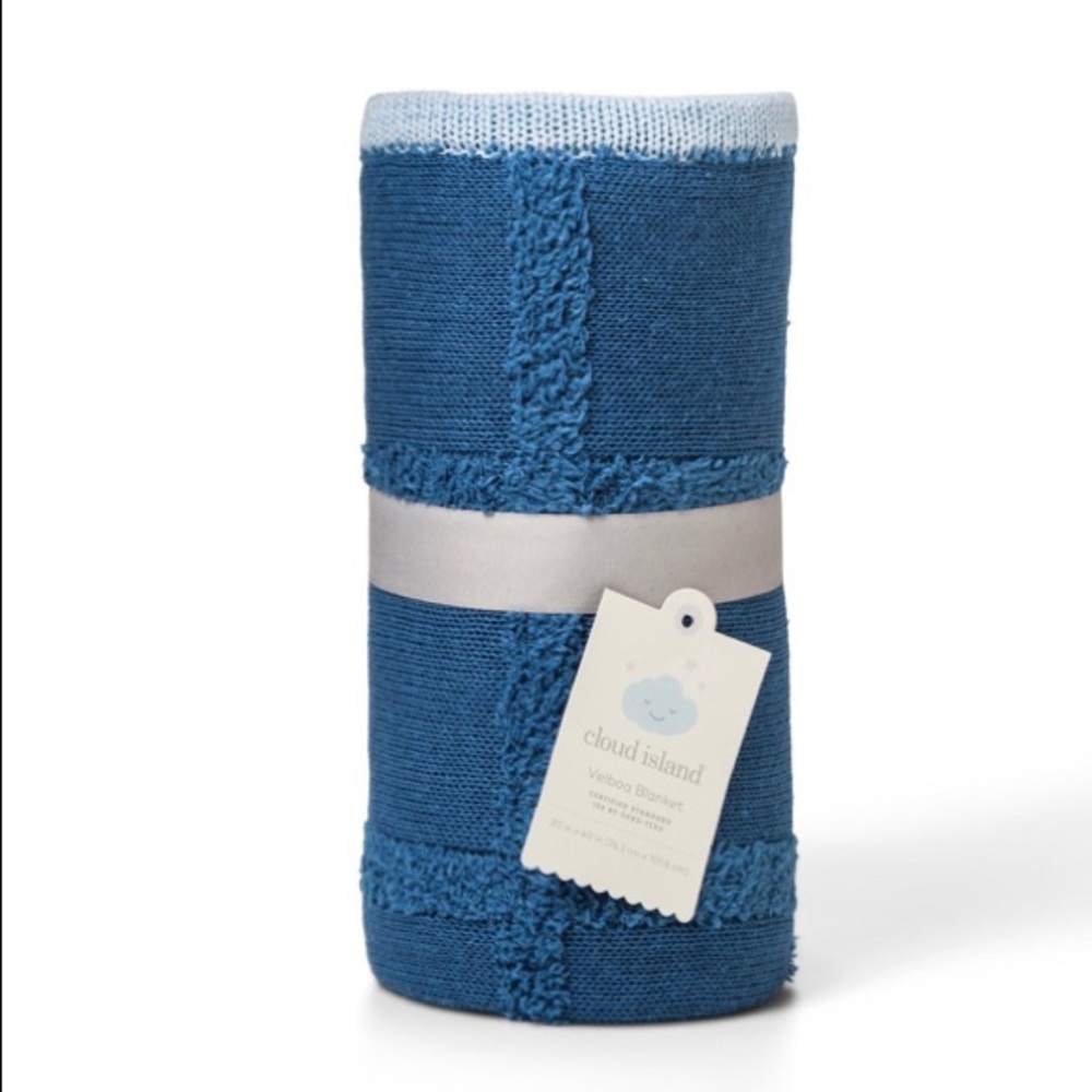ISO Cloud Island Sweater Knit Baby Blanket Solid-Blue. Sold at Target.